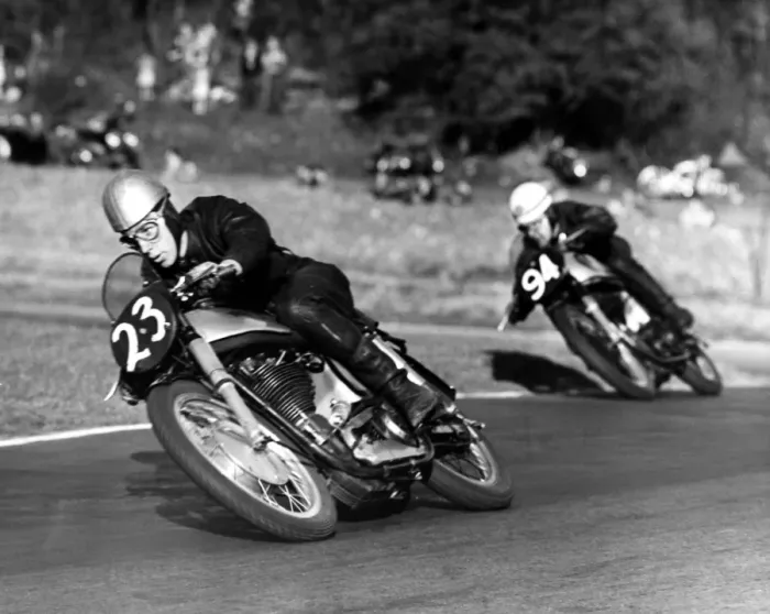 Framed Print : John Surtees compact crouch helps to streamline him at top speed. Here he corners Framed Print : John Surtees compact crouch helps to streamline him at top speed. Here he corners