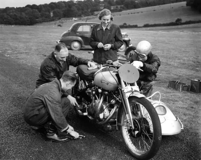 Framed Print : John Surtees and his family and friends get down to some motorbike maintenance at a race meeting Framed Print : John Surtees and his family and friends get down to some motorbike maintenance at a race meeting