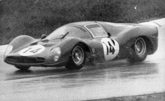 Framed Print : John Surtees pictured in action in heavy rain at the 1000 km Monza International race Framed Print : John Surtees pictured in action in heavy rain at the 1000 km Monza International race