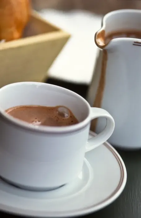 Framed Print : Jug and cup of hot drinking chocolate, on French cafe table credit: Marie-Louise Framed Print : Jug and cup of hot drinking chocolate, on French cafe table credit: Marie-Louise