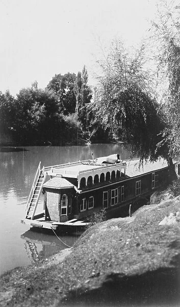 Kashmir, India. Maharajah Sir Hari Singhs private house - boat on the Jhelum