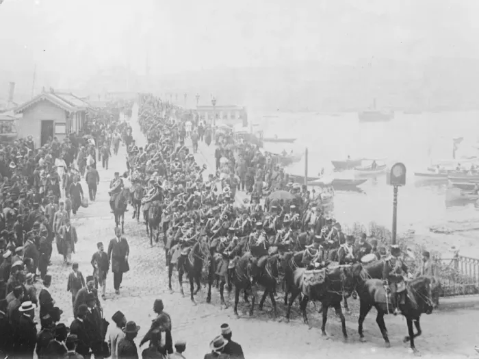 Framed Print : Kemals Mialed Fist Turkish Cavalry headed by their band, crossing from Stamboul