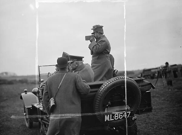 King Amanullah watches mimic tank battle. The King of Afghanistan taking a photograph