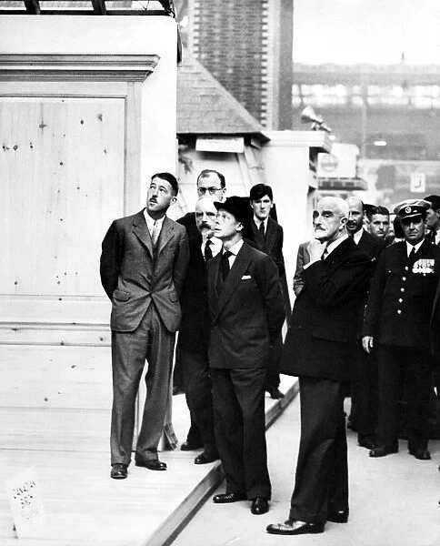 The King inspects the Canadian wood section of the Building Trades Exhibition at Olympia, London