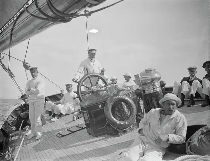 Framed Print : The King takes the wheel of his yacht Britannia. HM at the wheel. 7 August 1924 Framed Print : The King takes the wheel of his yacht Britannia. HM at the wheel. 7 August 1924