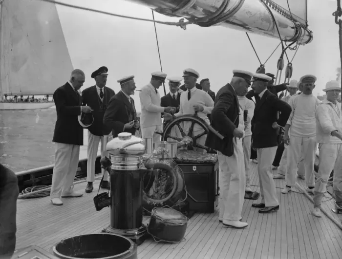 Framed Print : The King takes the wheel of his yacht Britannia. 7 August 1924 Framed Print : The King takes the wheel of his yacht Britannia. 7 August 1924