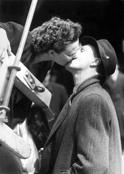 A kiss on board SS Winchester Castle, the immigration ship chartered by the South
