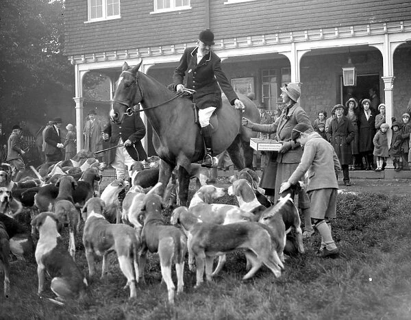 Lady selling poppies at the hunting Meet in Shipbourne, Kent. 1933