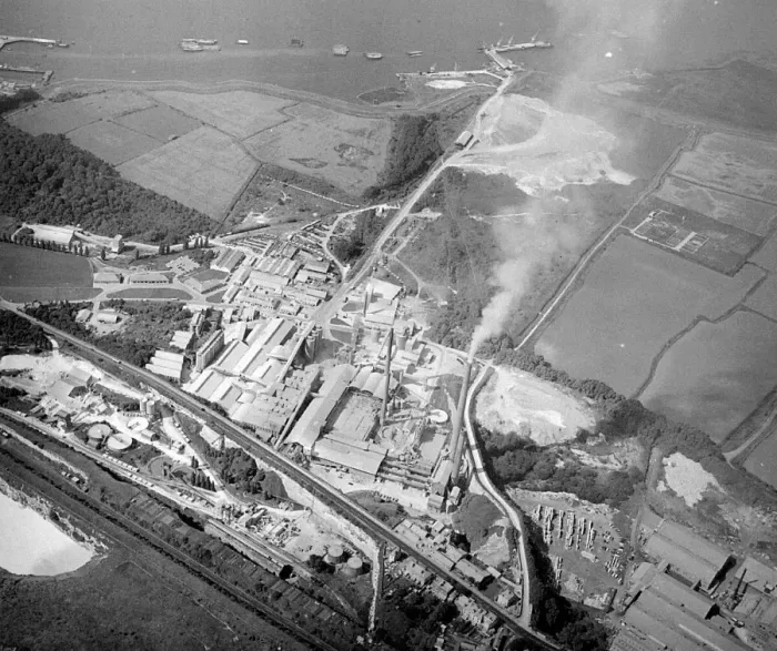 Framed Print : The lane stretching into the centre alongside the chimneys is Lovers Lane. The cement works