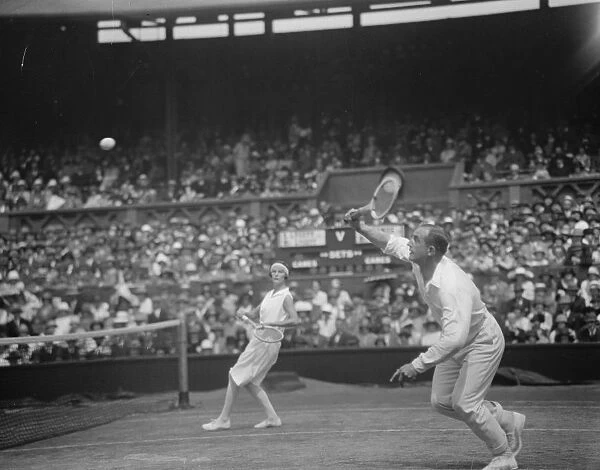 Lawn tennis championships at Wimbledon. Mr and Mrs Lycett in play. 2 July 1925