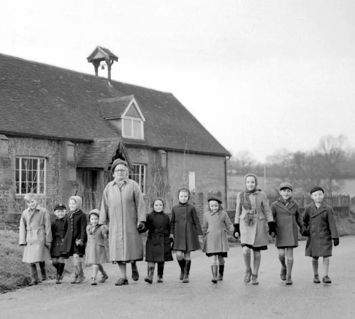 Framed Print : Leaving Stansted school in Kent. The smallest village school in the country. Mrs