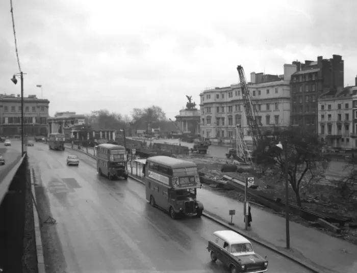 Framed Print : London buses driving past the construction of the new overpass - just one section Framed Print : London buses driving past the construction of the new overpass - just one section