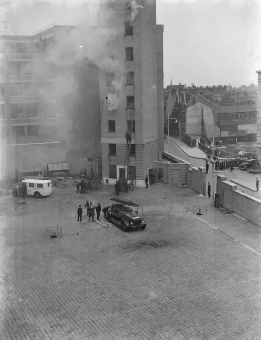 Framed Print : A London Fire Brigade display in Lambeth, London. Firemen use extension ladders Framed Print : A London Fire Brigade display in Lambeth, London. Firemen use extension ladders