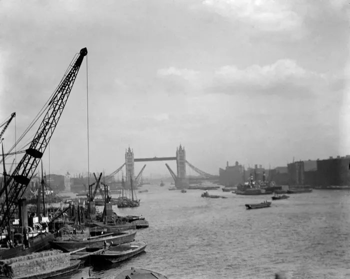 Framed Print : London. River Thames with barges, boats and crane with the Tower Bridge in Framed Print : London. River Thames with barges, boats and crane with the Tower Bridge in