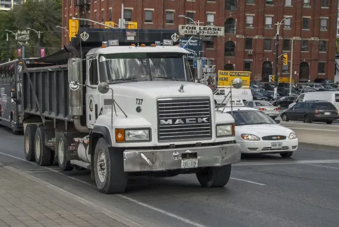 Framed Print : Mack 8 wheeled rigid tipper truck in down town Toronto traffic Framed Print : Mack 8 wheeled rigid tipper truck in down town Toronto traffic