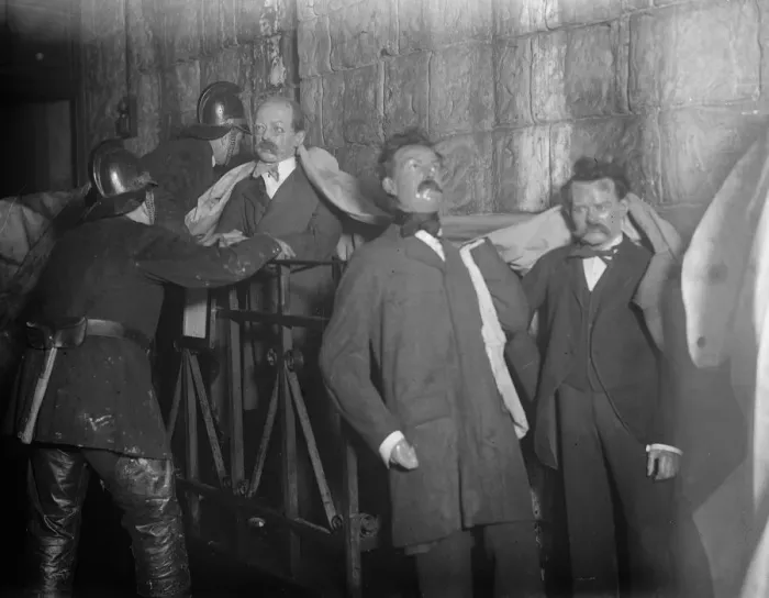 Framed Print : Madame Tussauds burned down. The figure of Crippen and others partly covered Framed Print : Madame Tussauds burned down. The figure of Crippen and others partly covered