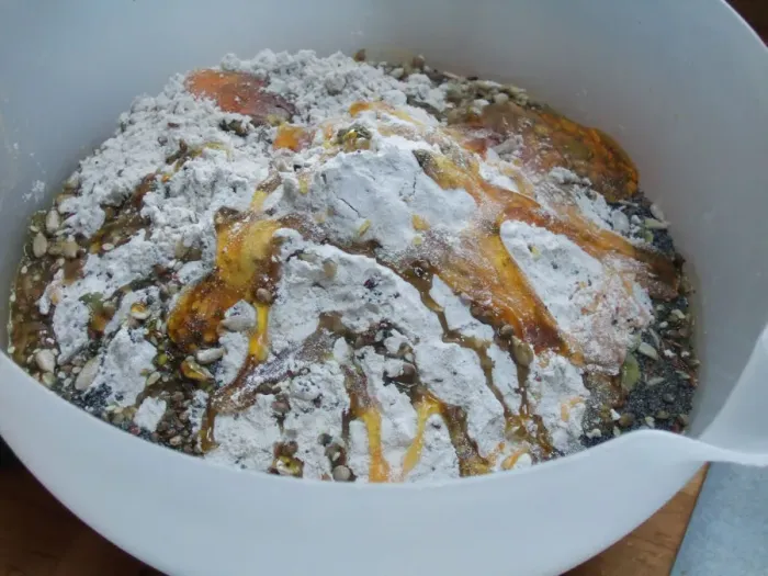 Framed Print : Making bread. Bowl with ingredients ready to mix. Wholemeal multigrain flour, pumpkin