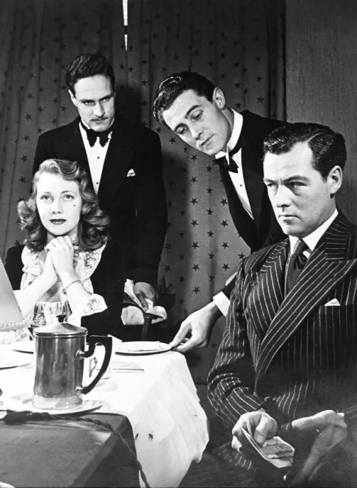 Framed Print : A man wants to impress his lady friend but two waiters produce the bill to the couple after dinner Framed Print : A man wants to impress his lady friend but two waiters produce the bill to the couple after dinner