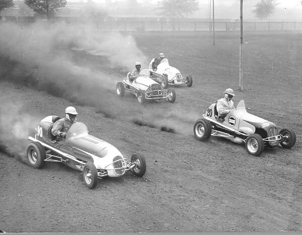 Members of the US Midget car team, warming up at speed at Walthamstow Stadium. May