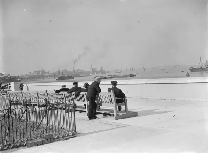 Framed Print : Men on benches enjoying the riversite view at Erith in Kent. 2 October 1937