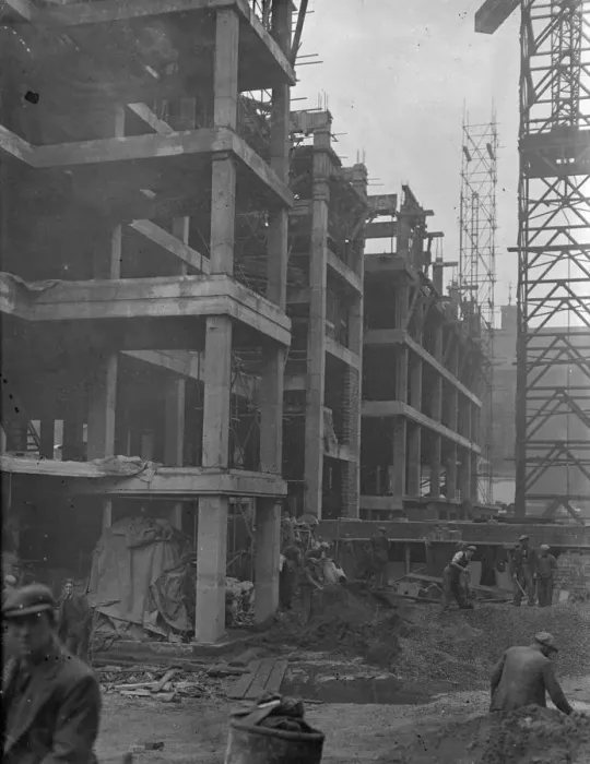 Framed Print : Men engaged on the building of a new wing at the Great Ormond Street Hospital declared Framed Print : Men engaged on the building of a new wing at the Great Ormond Street Hospital declared