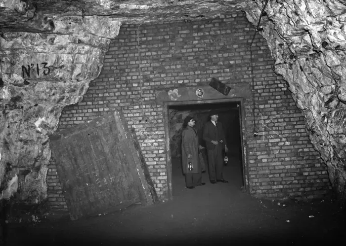 Framed Print : Men inside the Chislehurst caves at the explosive stores. 1938