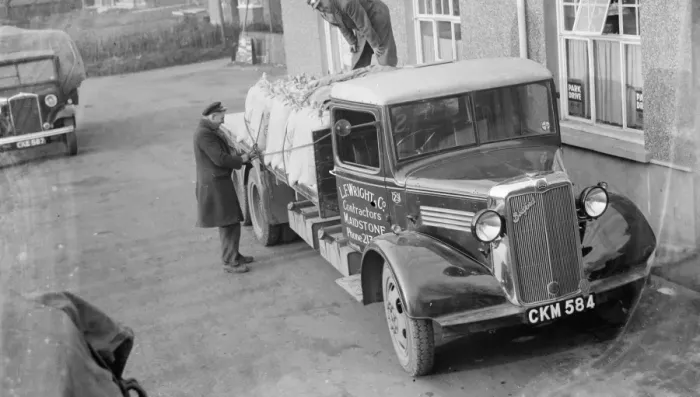 Framed Print : Men loading sacks onto an L E Wrights and Company Bedford truck. 1936 Framed Print : Men loading sacks onto an L E Wrights and Company Bedford truck. 1936
