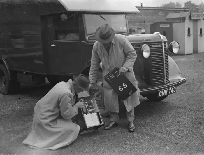 Framed Print : Men using a Bedford truck to set up the totalisators at Hurst Park Racecourse in Molesey Framed Print : Men using a Bedford truck to set up the totalisators at Hurst Park Racecourse in Molesey