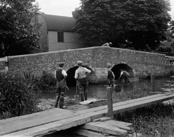 Framed Print : Men at work on river crossing at Eynsford bridge over the River Darent in Kent Framed Print : Men at work on river crossing at Eynsford bridge over the River Darent in Kent