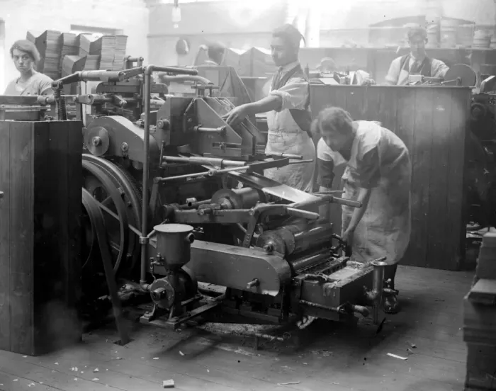 Framed Print : At Messrs James Burns Book Binding works at Esher. The Sheridan case making machine