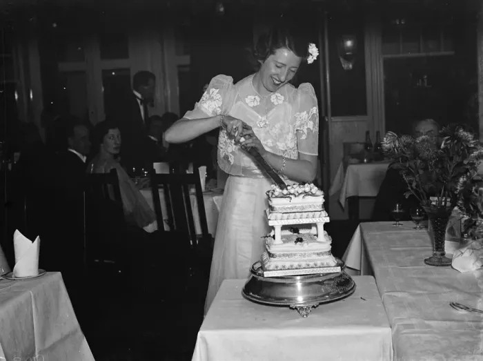 Framed Print : Miss Brands party in Southend, Essex. Cutting the cake. 1938 Framed Print : Miss Brands party in Southend, Essex. Cutting the cake. 1938