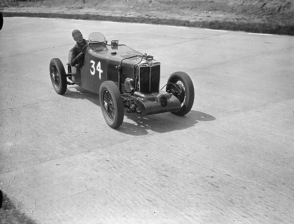 Miss D Stanley-Turner and her supercharged MG on the test hill hairpin during practice