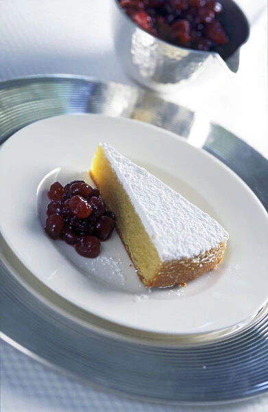 Moist dense sponge cake made with semolina served with cherry conserve credit