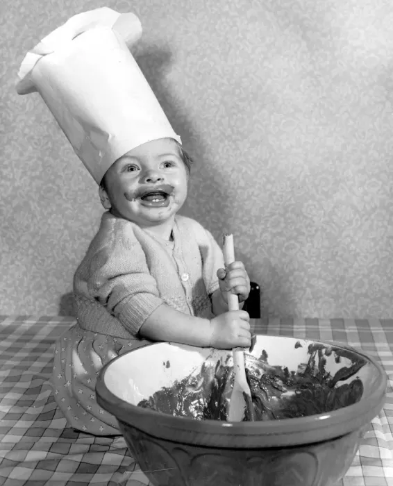 Framed Print : Eight months old Peter Raven of Bishops Stortford takes a hand in the mixing of Framed Print : Eight months old Peter Raven of Bishops Stortford takes a hand in the mixing of
