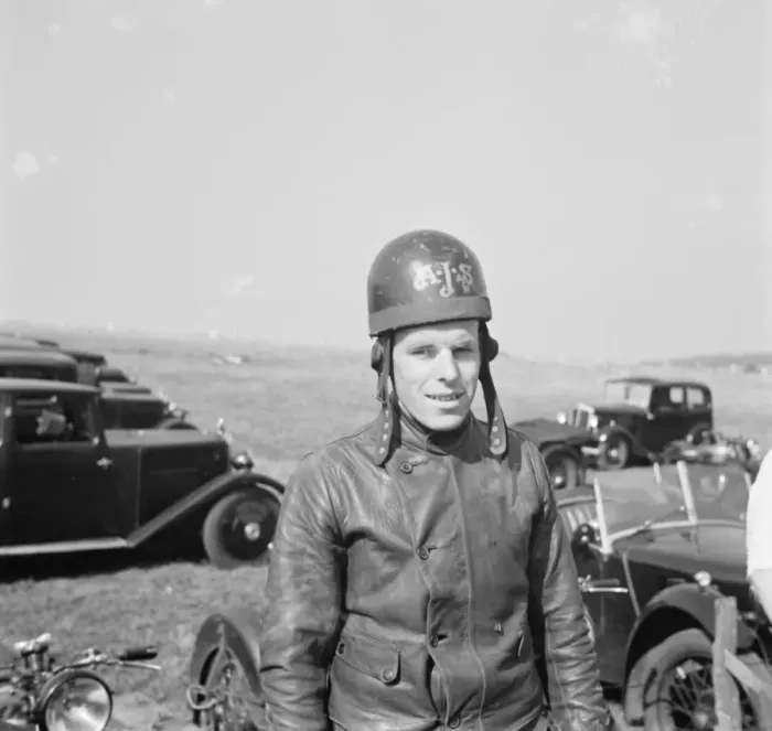 Framed Print : Motorcycle racing at Brands Hatch, Kent. A rider poses for a photo