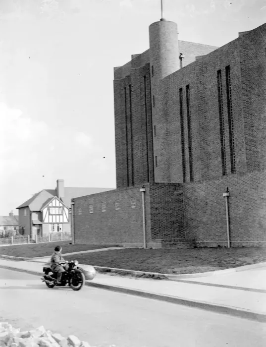 Framed Print : A motorcycle St Saviour Church, Eltham, Kent. 1934 Framed Print : A motorcycle St Saviour Church, Eltham, Kent. 1934