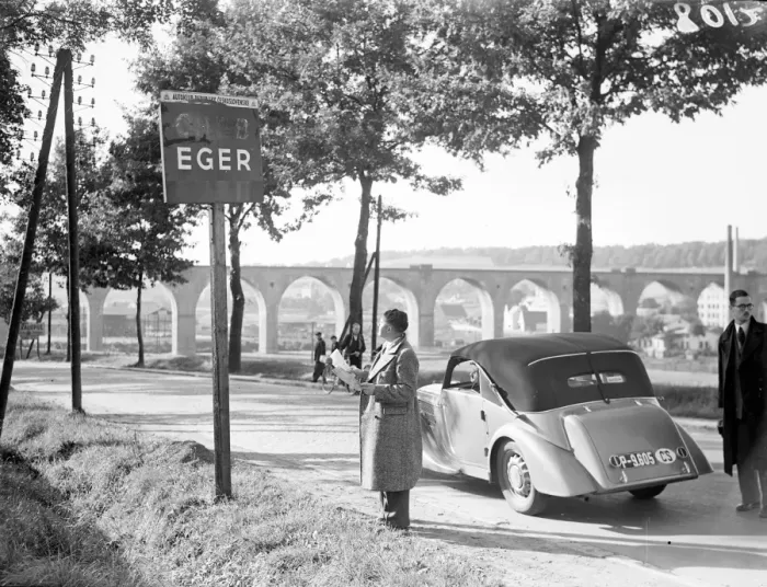 Framed Print : A motorist looking at the sign at the entrance to the town of Eger, the Sudetenland Storm Centre Framed Print : A motorist looking at the sign at the entrance to the town of Eger, the Sudetenland Storm Centre