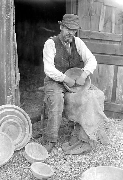 Mr George Lailey engaged in the ancient craft of wooden bowl making at Bucklebury, Berks