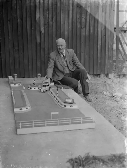Framed Print : Mr J Ratcliff with a model of Wren Road in Sidcup, Kent. 12 April 1938 Framed Print : Mr J Ratcliff with a model of Wren Road in Sidcup, Kent. 12 April 1938