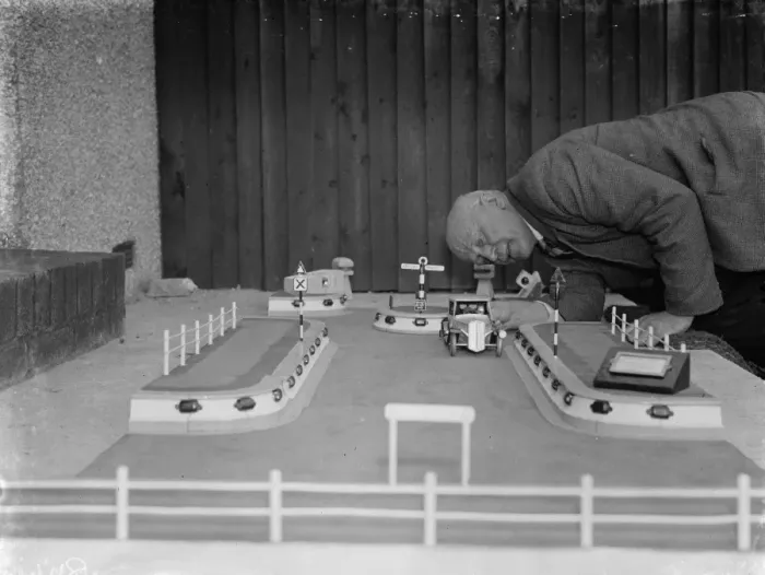 Framed Print : Mr J Ratcliff with a model of Wren Road in Sidcup, Kent. 12 April 1938 Framed Print : Mr J Ratcliff with a model of Wren Road in Sidcup, Kent. 12 April 1938