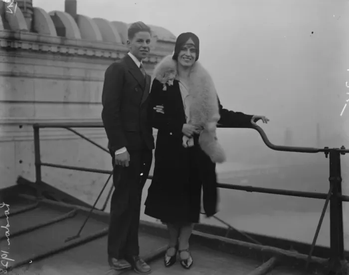 Framed Print : Mrs Aimee McPherson arrives. Mrs McPherson with her son on the roof her hotel after