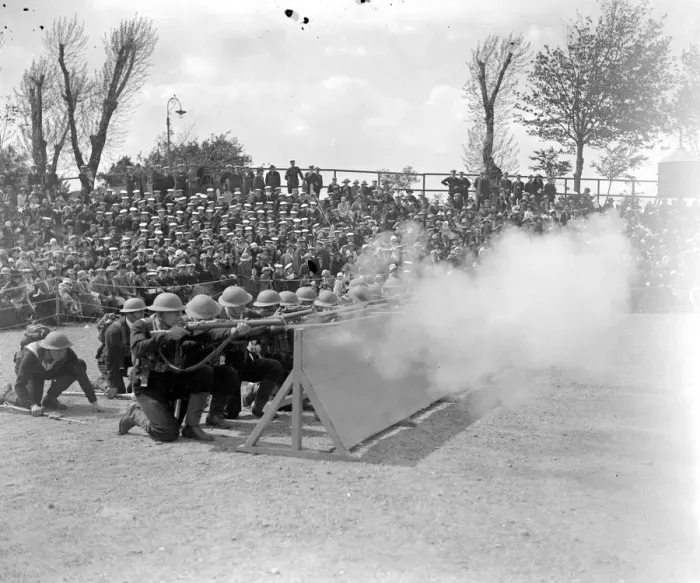 Framed Print : Naval display rehearsal at Whale Island for the Royal Tournament. Attacking the enemy from cover