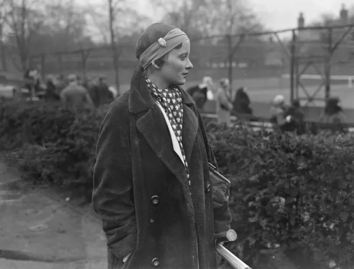 Framed Print : New fashion in tennis headwear. Miss J Mc Alpine plays with watch in bandou Framed Print : New fashion in tennis headwear. Miss J Mc Alpine plays with watch in bandou