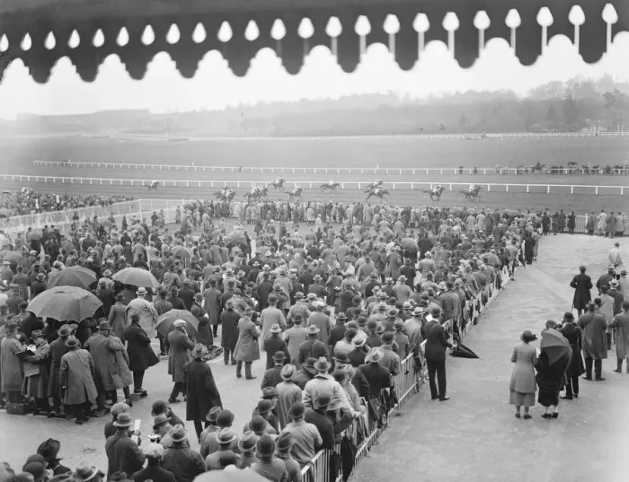 Framed Print : At the Newbury Races. A view showing the crowd and the finish of the first race Framed Print : At the Newbury Races. A view showing the crowd and the finish of the first race