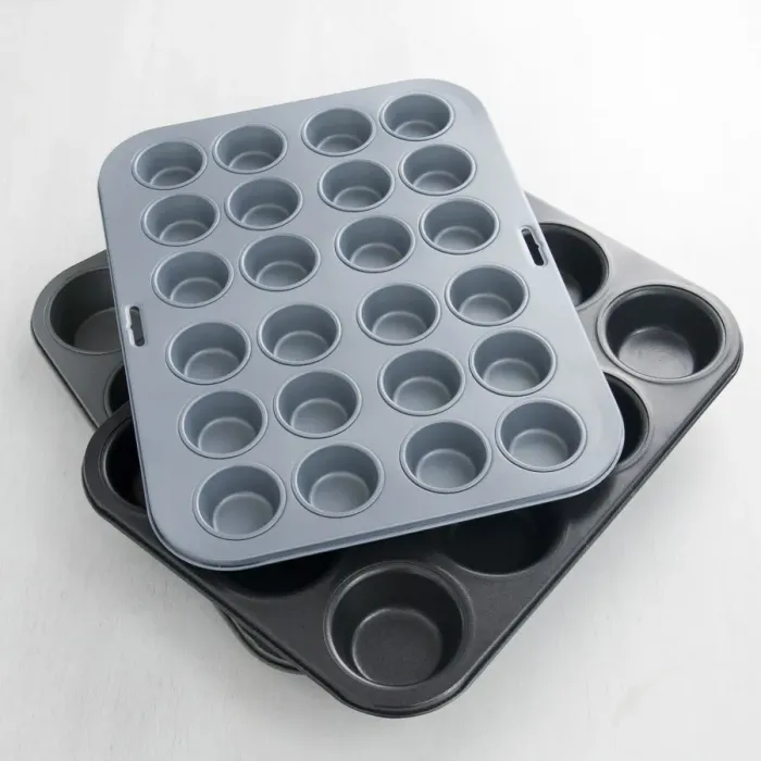 Framed Print : Non-stick metal muffin baking tins credit: Marie-Louise Avery / thePictureKitchen Framed Print : Non-stick metal muffin baking tins credit: Marie-Louise Avery / thePictureKitchen