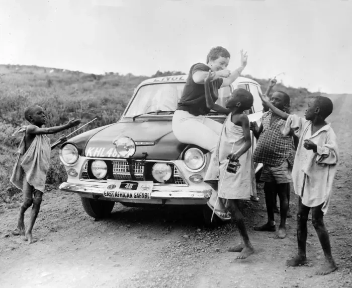 Framed Print : Nr Nairobi, Kenya : British rally driver Pat Moss with East African boys sat Framed Print : Nr Nairobi, Kenya : British rally driver Pat Moss with East African boys sat