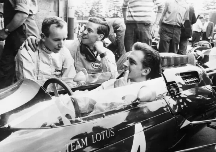 Framed Print : Nurburgring Lotus team driver Trevor Taylor gets some friendly advice from fellow