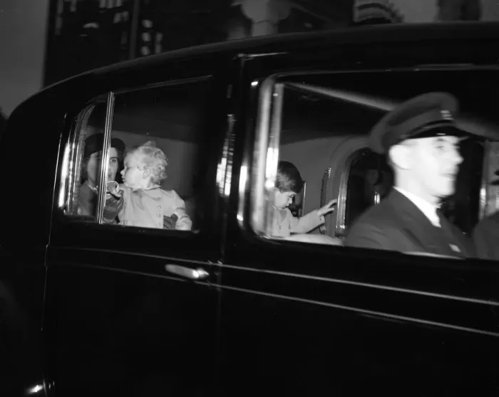 Framed Print : Nurse Helen Lightbody holds Princess Anne, and Prince Charles amuses himself by