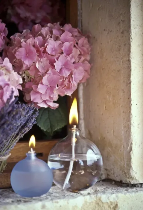Framed Print : Two oil burner lamps with pink hydrangea and lavender in window niche credit: Marie-Louise Framed Print : Two oil burner lamps with pink hydrangea and lavender in window niche credit: Marie-Louise