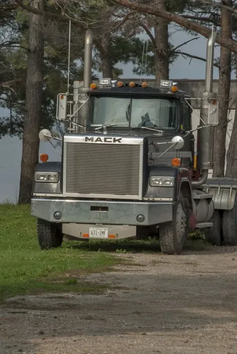 Framed Print : Old MACK 4x4 semi (articulated) tractor unit parked up on Manitoulin Island Ontario Framed Print : Old MACK 4x4 semi (articulated) tractor unit parked up on Manitoulin Island Ontario